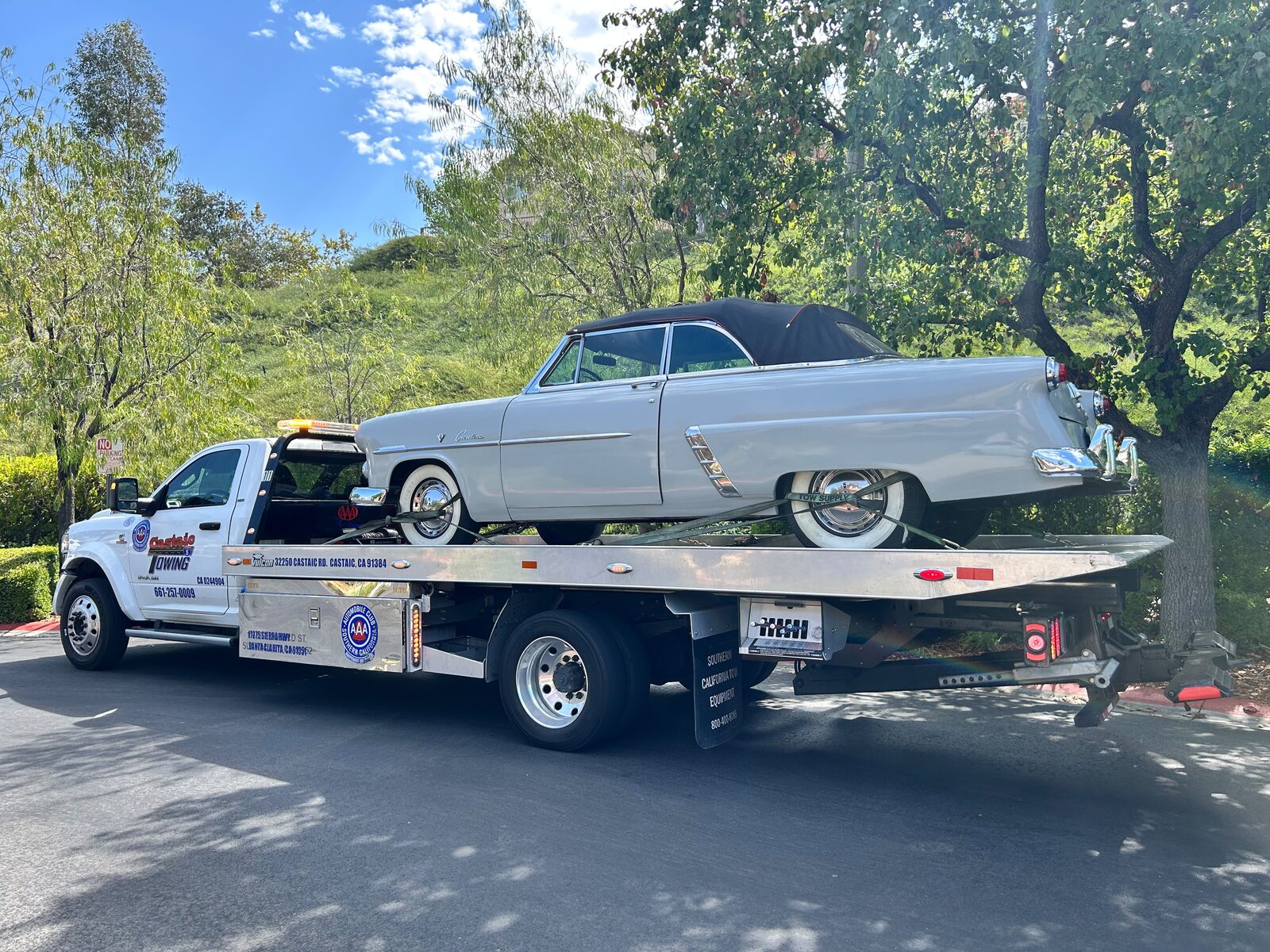 Classic convertible on a Castaic Towing flatbed